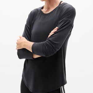 Athelta Move With Ease Top in black - Tall women's extra front length